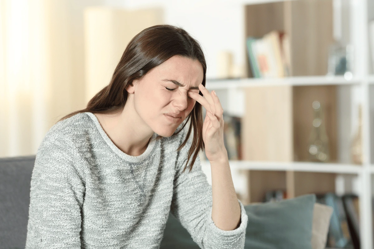 a woman suffering from dry eyes even after eye drops